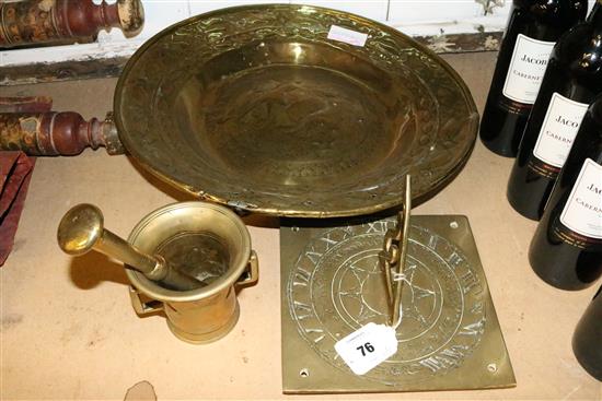 17th Century brass alms dish, brass pestle and mortar and a sun dial